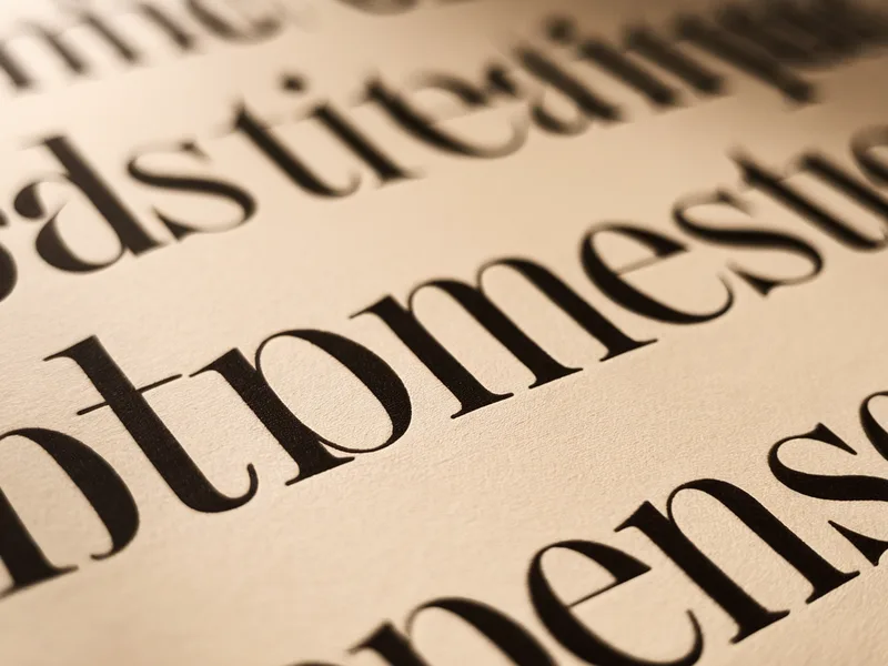 Letterforms, set in metal
